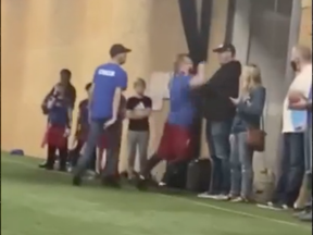 A flag football coach in Michigan unloads on an unsuspecting parent.