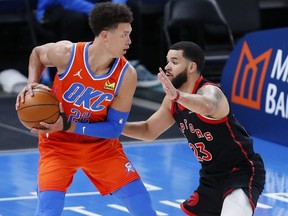 Oklahoma City Thunder centre Isaiah Roby is defended by Toronto Raptors guard Fred VanVleet on a drive during the second half at Chesapeake Energy Arena on March 31, 2021.