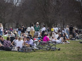 People gather late afternoon in Trinity Bellwoods Park in Toronto, Ont. on Saturday, April 10, 2021.