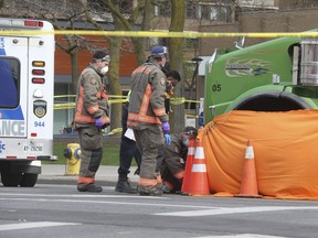 A woman in a wheelchair was struck and killed by a dump truck at Main St. and Danforth Ave. on Tuesday, April 27, 2021.