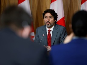 Prime Minister Justin Trudeau attends a news conference, as efforts continue to help slow the spread of COVID-19, in Ottawa, April 9, 2021.