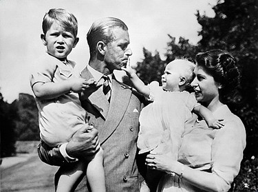 In an undated file picture, Queen Elizabeth II and her husband Prince Philip, Duke of Edinburgh walk with their children, Prince Charles, Prince of Wales and Princess Anne.
