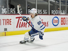 Maple Leafs winger William Nylander celebrates his goal against the Vancouver Canucks on Sunday night. Nylander was in the lineup Tuesday against the Canucks, a day after he was late for a team meeting.