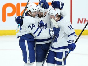 Toronto Maple Leafs forward Nick Foligno (centre) and Auston Matthews (left) and Mitch Marner are getting used to being on the same line.