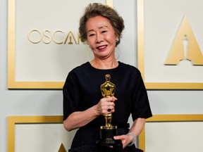 Yuh-Jung Youn, winner of the award for Best Actress in a Supporting Role for "Minari", poses in the Oscars press room, at the 93rd Academy Awards in Los Angeles, Sunday, April 25, 2021.