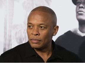 In this file photo taken on August 10, 2015 rapper/producer Dr. Dre arrives for the Universal Pictures And Legendary Pictures premiere of "Straight Outta Compton" in Los Angeles.