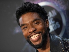 Chadwick Boseman poses in the press room during the 2019 American Music Awards at the Microsoft theatre in Los Angeles.