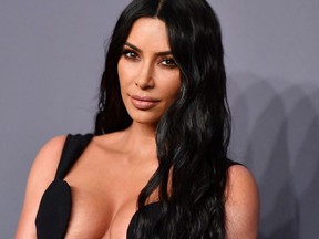 In this file photo taken on February 06, 2019, US media personality Kim Kardashian West arrives to attend the amfAR Gala New York.