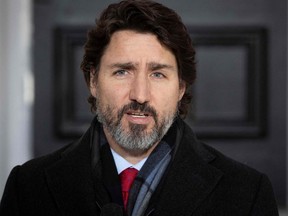 In this file photo taken on December 18, 2020 Canadian Prime Minister Justin Trudeau speaks during a Covid-19 briefing at the Rideau Cottage in Ottawa, Ontario.
