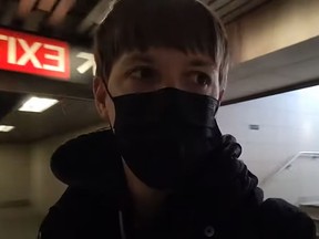 Vlogger Johnny Strides, filming himself as he enters the subway portion of Broadview station on April 1, 2021.
