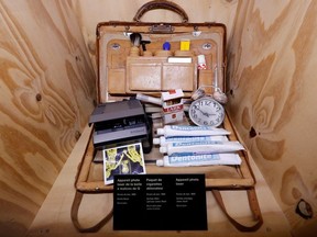 Q’S Bag Of Tricks is displayed during a press presentation of the exhibition “The Designing 007: Fifty Years of Bond Style” at the Grande Halle de la Villette in Paris, France, April 13, 2016.
