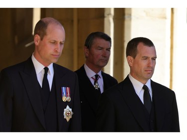 Britain's Prince William, Duke of Cambridge and Peter Phillips look on during the funeral of Britain's Prince Philip, husband of Queen Elizabeth, who died at the age of 99, in Windsor, Britain, April 17, 2021. Chris Jackson/Pool via REUTERS ORG XMIT: GDN