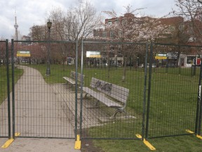Cherry blossoms are starting to bloom in Toronto and the trees at Trinity Bellwood's park have been fenced in by the City of Toronto on Thursday, April 15, 2021.
