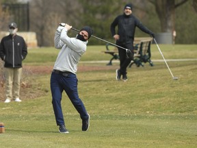 Golf season officially opened in Toronto at the Humber Valley golf course off of Albion Rd. - one of the city's five public golf courses. Humber Valley is celebrating its 100th anniversary and club pro Mike Dale (pictured) tees off on the first hole to celebrate it on Thursday April 1, 2021.