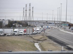 The northbound lanes off Hwy. 427 funnel off to the Hwy. 7 northbound exit. Traffic was backup up about a kilometre south to almost Hwy. 407 as road crews worked on the highway in the northbound and southbound lanes on Thursday, April 22, 2021.