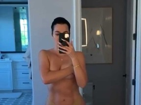 Khloe Kardashian is pictured in a screengrab of a “unretouched” video she posted on Instagram, showing off her body.