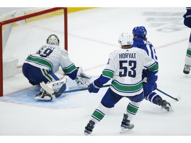 Toronto Maple Leafs Mitch Marner RW (16) scores after capitalizing on Vancouver Canucks Braden Holtby G (49) giveaway during the third period in Toronto on Thursday April 29, 2021. Jack Boland/Toronto Sun/Postmedia Network
