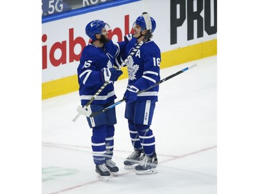 Toronto Maple Leafs Mitch Marner RW (16) scores after capitalizing on Vancouver Canucks Braden Holtby G (49) giveaway with teammate TAlexander Kerfoot C (15) during the third period in Toronto on Thursday April 29, 2021. Jack Boland/Toronto Sun/Postmedia Network