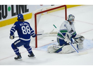 Toronto Maple Leafs William Nylander RW (88) beats Vancouver Canucks Braden Holtby G (49) to the far side corner during the first period in Toronto on Thursday April 29, 2021. Jack Boland/Toronto Sun/Postmedia Network