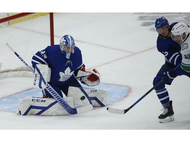 Toronto Maple Leafs David Rittich G (33) keeps his eye on the incoming shot during the second period in Toronto on Thursday April 29, 2021. Jack Boland/Toronto Sun/Postmedia Network