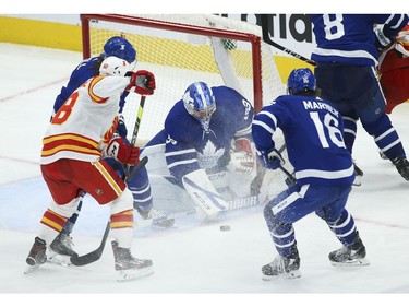 Toronto Maple Leafs David Rittich G (33) tries to smother the puck during the third period in Toronto on Tuesday April 13, 2021. Jack Boland/Toronto Sun/Postmedia Network