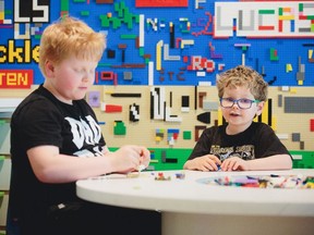 Sebastian (left) and Avery  Togyi play together at a Ronald McDonald House in Vancouver.