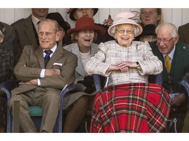 Queen Elizabeth II and Prince Philip, the Duke of Edinburgh, attend the annual Braemar Highland Games in Braemar, Scotland, Sept. 2, 2017.