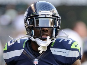 Seattle Seahawks defensive back Phillip Adams warms up prior to the NFL game against the Tennessee Titans at CenturyLink Field in Seattle, Washington, U.S. August 11, 2012.