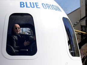 Amazon and Blue Origin founder Jeff Bezos addresses the media about the New Shepard rocket booster and Crew Capsule mockup at the 33rd Space Symposium in Colorado Springs, Colorado, United States April 5, 2017.