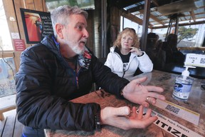Timothy's Pub owner Tim Brem and his wife Robin have been in business for the past 23 years on Browns Line in Etobicoke. They were in their front patio on Good Friday discussing the province shutting down businesses, like their own, again at 12:01 a.m. Saturday morning for the next 28 days on Friday, April 2, 2021.