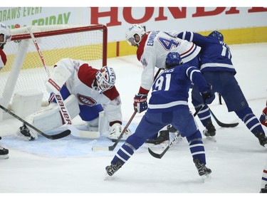 Montreal Canadiens Jake Allen G (34) smothers the puck during the first period in Toronto on Wednesday April 7, 2021. Jack Boland/Toronto Sun/Postmedia Network