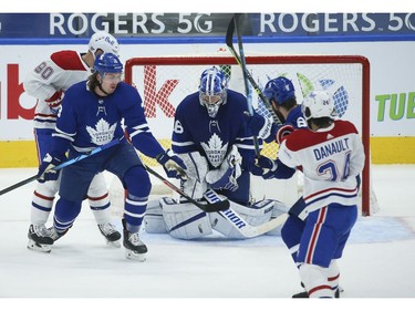 Toronto Maple Leafs Jack Campbell G (36) makes the save during heavy traffic in front of the net during the second period in Toronto on Wednesday April 7, 2021. Jack Boland/Toronto Sun/Postmedia Network