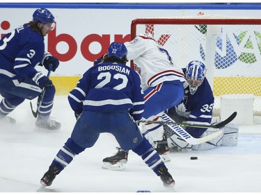 Toronto Maple Leafs Jack Campbell G (36) looks for the loose puck on Montreal Canadiens Tyler Toffoli RW (73) during the second period in Toronto on Wednesday April 7, 2021. Jack Boland/Toronto Sun/Postmedia Network