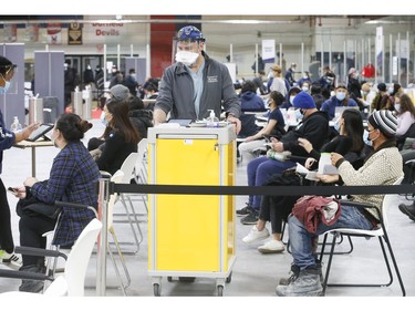 As many as 1,500 people were vaccinated with Pfizer-BioNTech COVID-19 vaccine on Wednesday at the Humber River Hospital Vaccination Clinic held at Downsview Arena on Wednesday April 21, 2021. Jack Boland/Toronto Sun/Postmedia Network