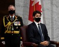 Then Chief of Defence Staff Jonathan Vance and Prime Minister Justin Trudeau listen to Canada's Governor General Julie Payette delivering the throne speech in the Senate chamber in Ottawa, Ontario, Canada on Sept. 23, 2020.