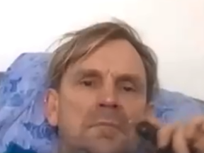 Estonian MP Tarmo Kruusimäe is seen vaping in bed during a remote parliamentary meeting.