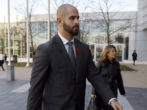 Michael Theriault arrive sat the Durham Region Courthouse in Oshawa on November 6, 2019.