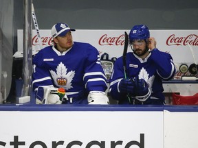 Goaltender Frederik Andersen  (left) sits on the Toronto Marlies bench on May 6 during a conditioning stint in the AHL.