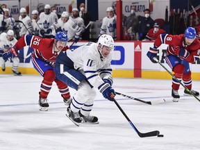 Zach Hyman of the Toronto Maple Leafs pulls away from Habs defencemen Jeff Petry (left) and Ben Chiarot for a third-period breakaway in Game 4 on Tuesday night. Hyman was stopped by Carey Prce on the play.