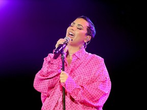 Demi Lovato performs during the OBB Premiere Event for YouTube Originals Docuseries "Demi Lovato: Dancing With The Devil" at The Beverly Hilton on March 22, 2021 in Beverly Hills, California.