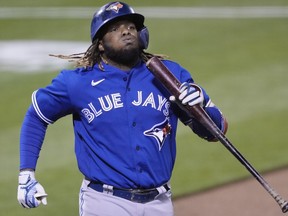 Vladimir Guerrero Jr. of the Toronto Blue Jays reacts after he was called out on strikes against the Oakland Athletics in the seventh inning at the Oakland Coliseum on May 04, 2021.
