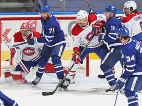 Leafs forward Nick Foligno tries to tip a shot past Canadiens goalie Carey Price on Thursday.