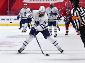 Toronto Maple Leafs forward Alex Galchenyuk shoots into an empty net for a goal against the Montreal Canadiens on Tuesday.