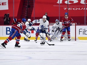 Maple Leafs forward Ilya Mikheyev attempts to block a shot by Montreal Canadiens defeneman Shea Weber during Tuesday's game.