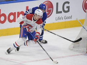 Montreal Canadiens forward Jesperi Kotkaniemi steals the puck from Toronto Maple Leafs defenceman Rasmus Sandin during Game 5 on Thursday night.