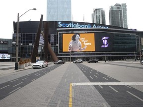 An advertisement on the big screen at the Scotiabank Arena shouts "For the fans." COVID restrictions ensured Maple Leaf Square was a ghost town on May 9, 2021.