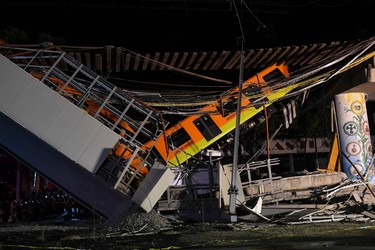 A general view shows the site of a train accident after an elevated metro line collapsed in Mexico City on May 4, 2021.