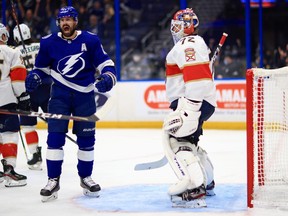 Alex Killorn, left, of the Tampa Bay Lightning celebrates a goal in the second peiod during Game Four of the First Round of the 2021 Stanley Cup Playoffs against the Florida Panthers at Amalie Arena on May 22, 2021 in Tampa, Fla.