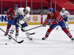 Montreal Canadiens forward Josh Anderson battles with Toronto Maple Leafs centre Auston Matthews in game 3 in Montreal.