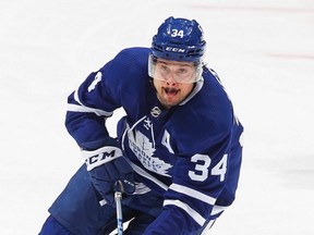 Maple Leafs forward Auston Matthews skates with the puck against the Canadiens in Game 2 of the first round of the 2021 Stanley Cup Playoffs at Scotiabank Arena in Toronto, Saturday, May 22, 2021.